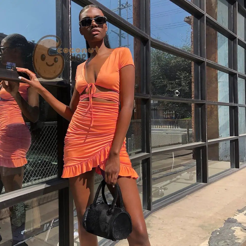 Seductive Sophistication: Embrace the Women’s Deep V-Neck Hollow Ruffled Hip Sexy Dress with Alluring Waist Cutout!