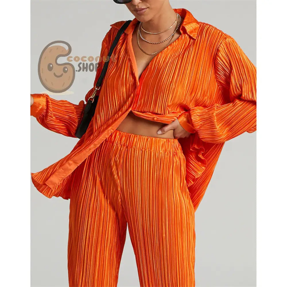 Sophisticated Pleated V-Neck Shirt and Casual Pants Two-Piece Set – Elegance Redefined