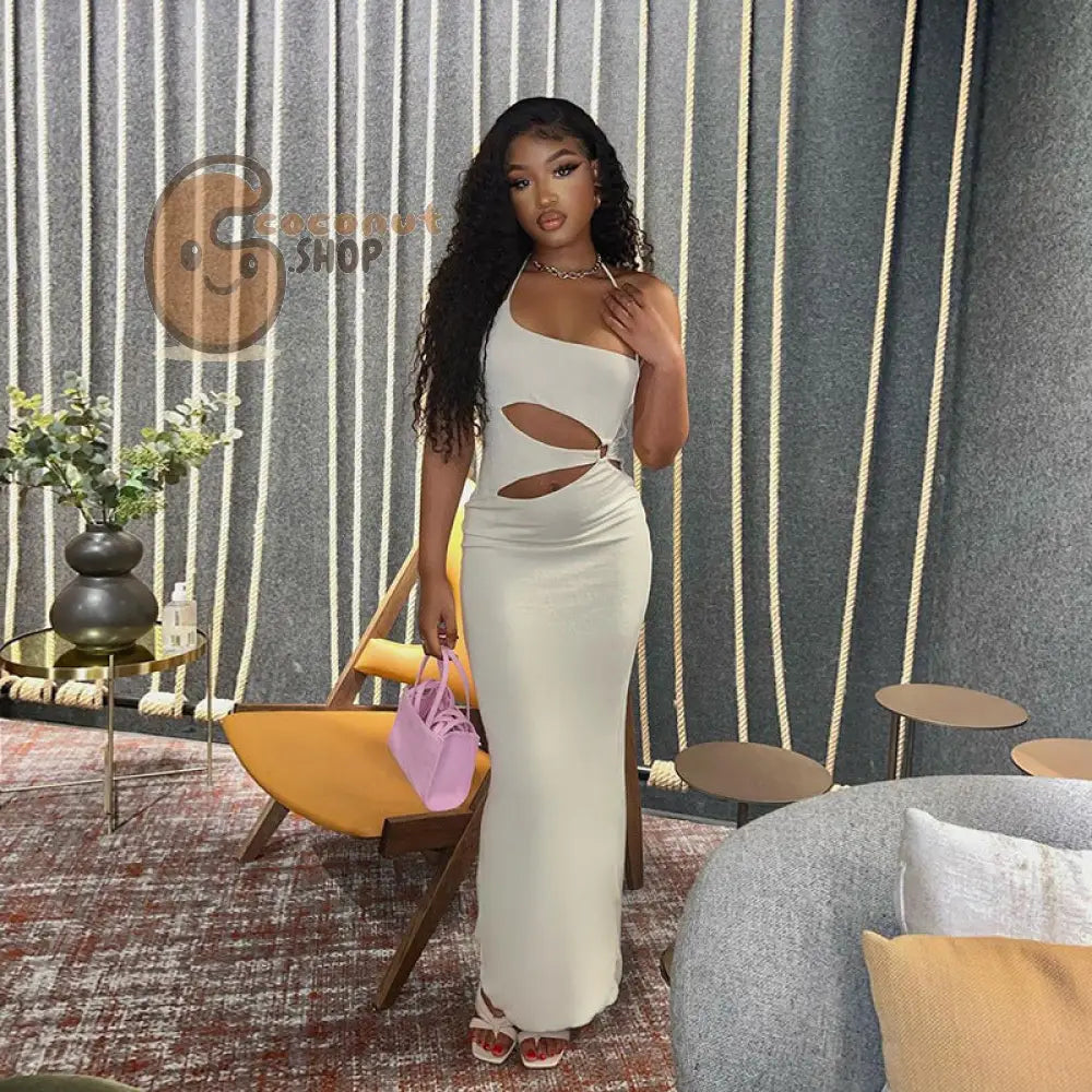 Sunkissed Glamour: Embrace Holiday Vibes with the Women’s Ring Hollow Halter Solid Color Dress - Long Skirt