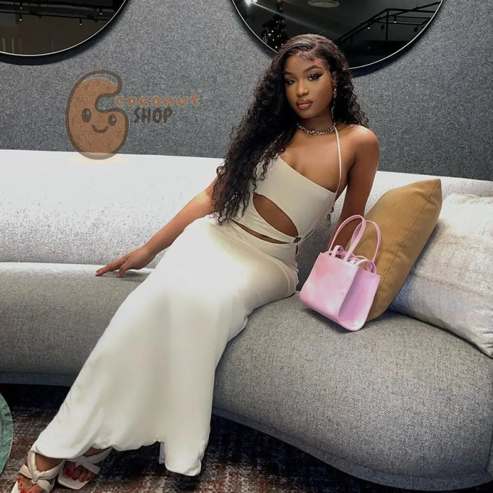 Sunkissed Glamour: Embrace Holiday Vibes with the Women’s Ring Hollow Halter Solid Color Dress - Long Skirt