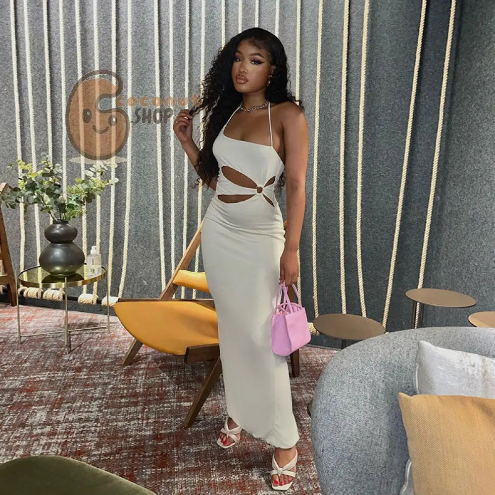 Sunkissed Glamour: Embrace Holiday Vibes with the Women’s Ring Hollow Halter Solid Color Dress - Long Skirt